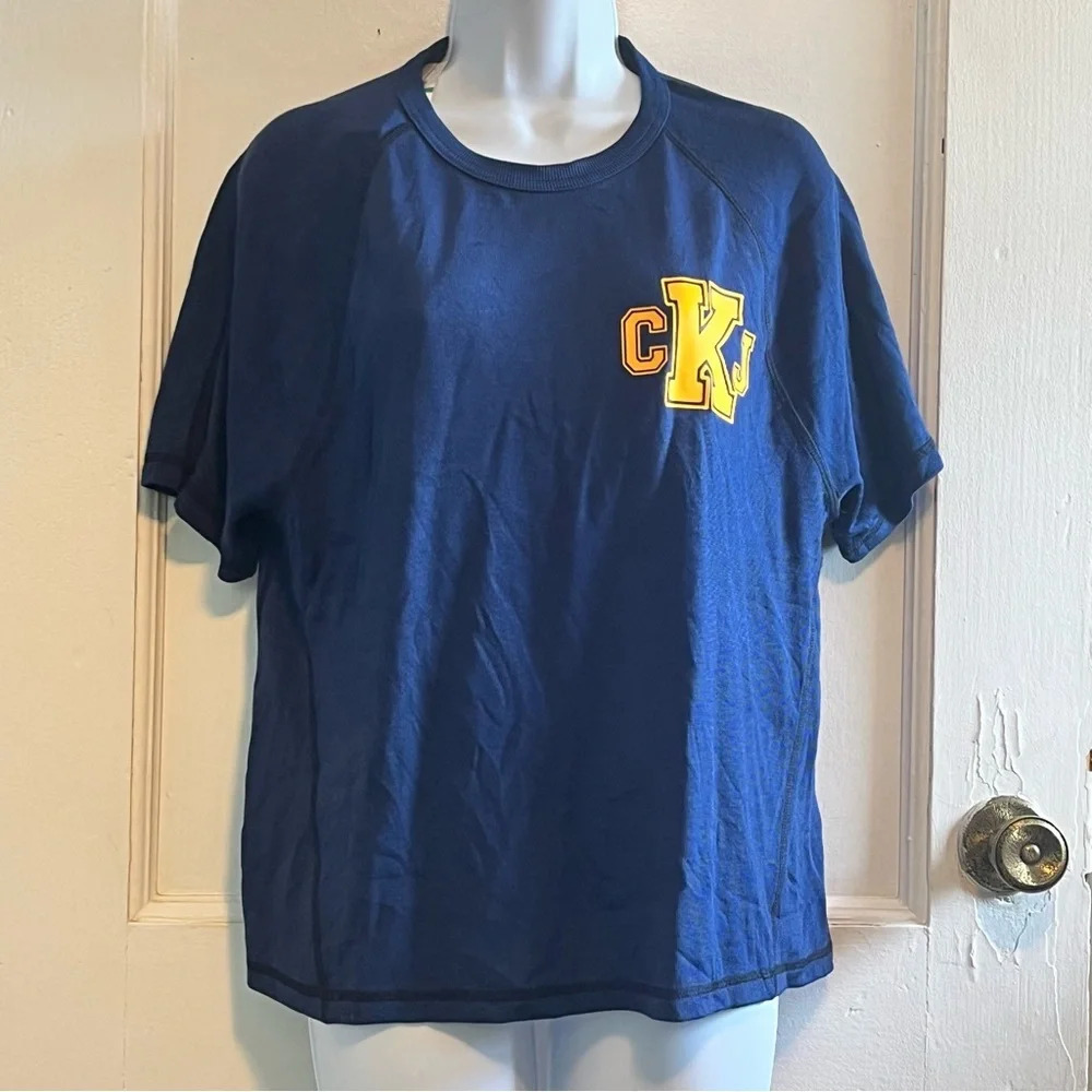 Calvin Klein jersey like tshirt  NWT size large navy with gold logo